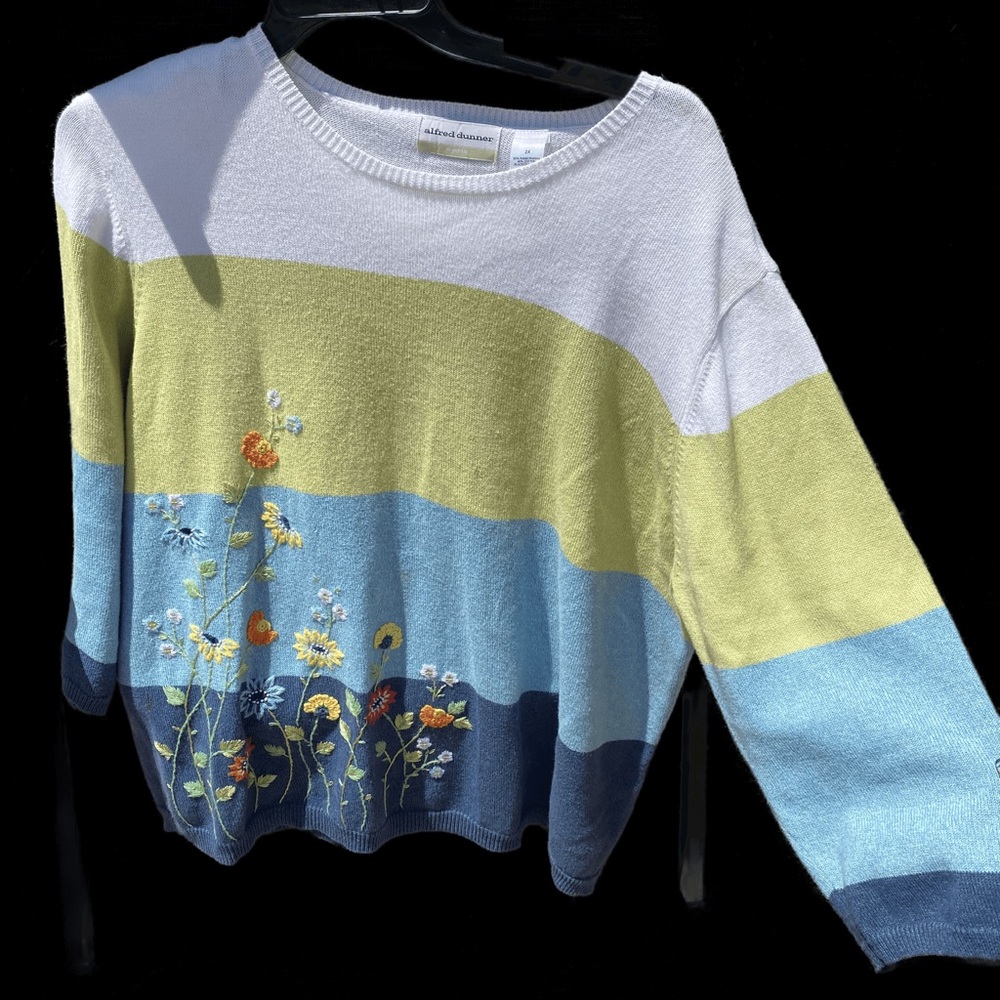 Unique green, blue, and white sweatshirt with flower embroidery